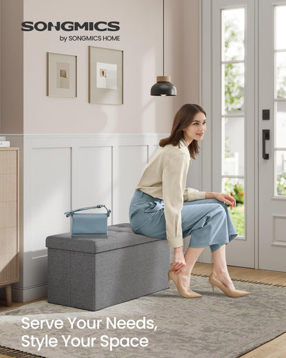 SONGMICS MAZIE Collection - 30 Inches Folding Storage Ottoman Bench, Ottoman Foot Rest, End of Bed Bench, Storage Chest, Load 660 lb, for Living Room, Bedroom, Entryway, Dark Gray ULSF47K